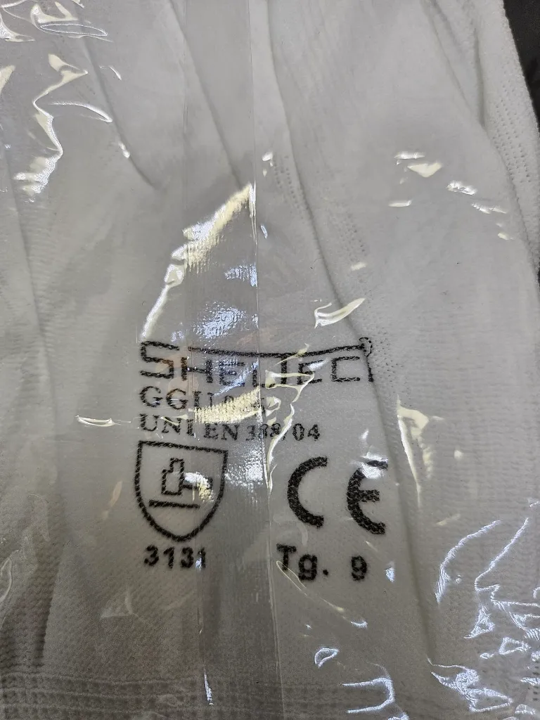 Guanto Sheltech simboli.webp